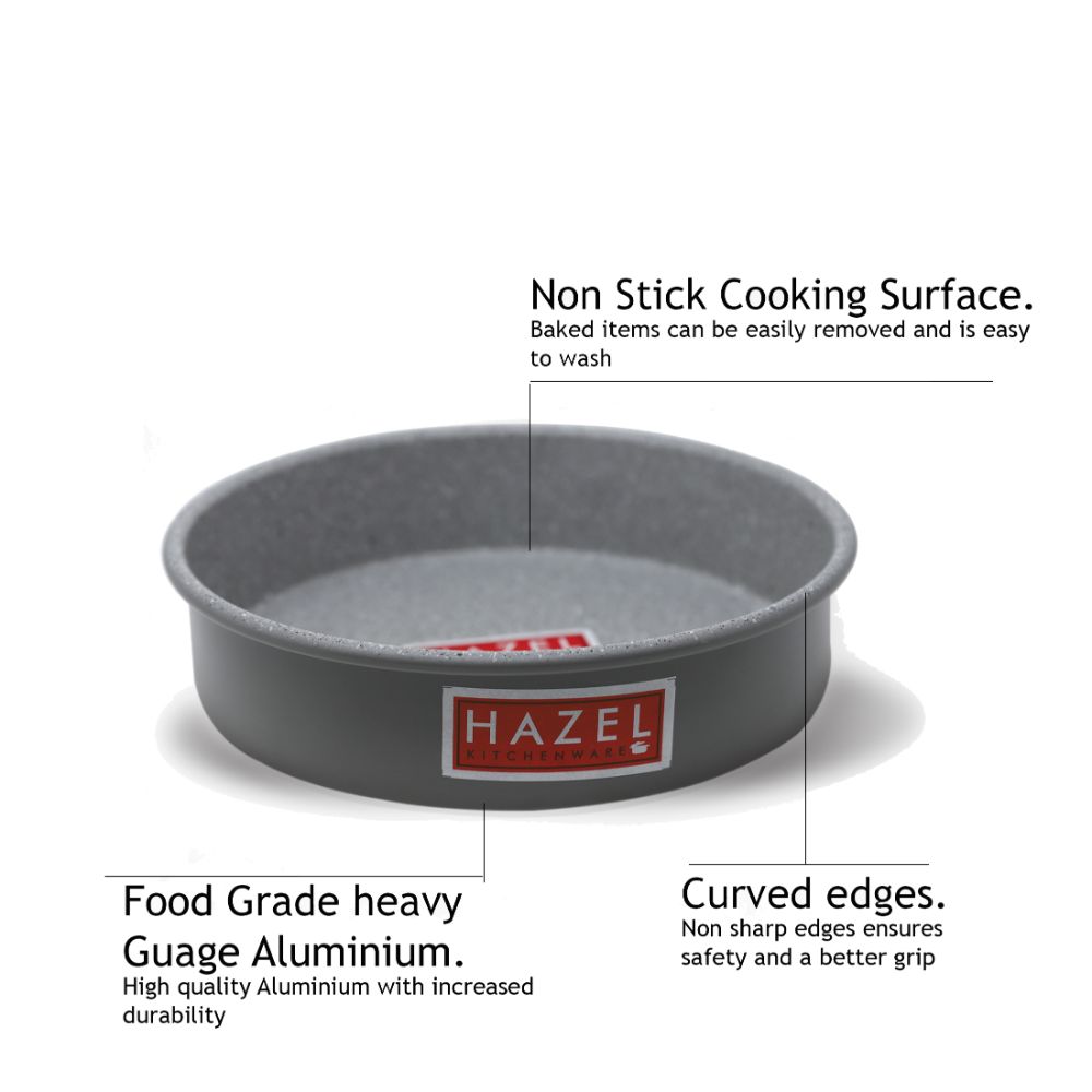Cake mould with feature callouts: Non Stick Cooking Surface, heavy Guage Aluminium, Curved edges.