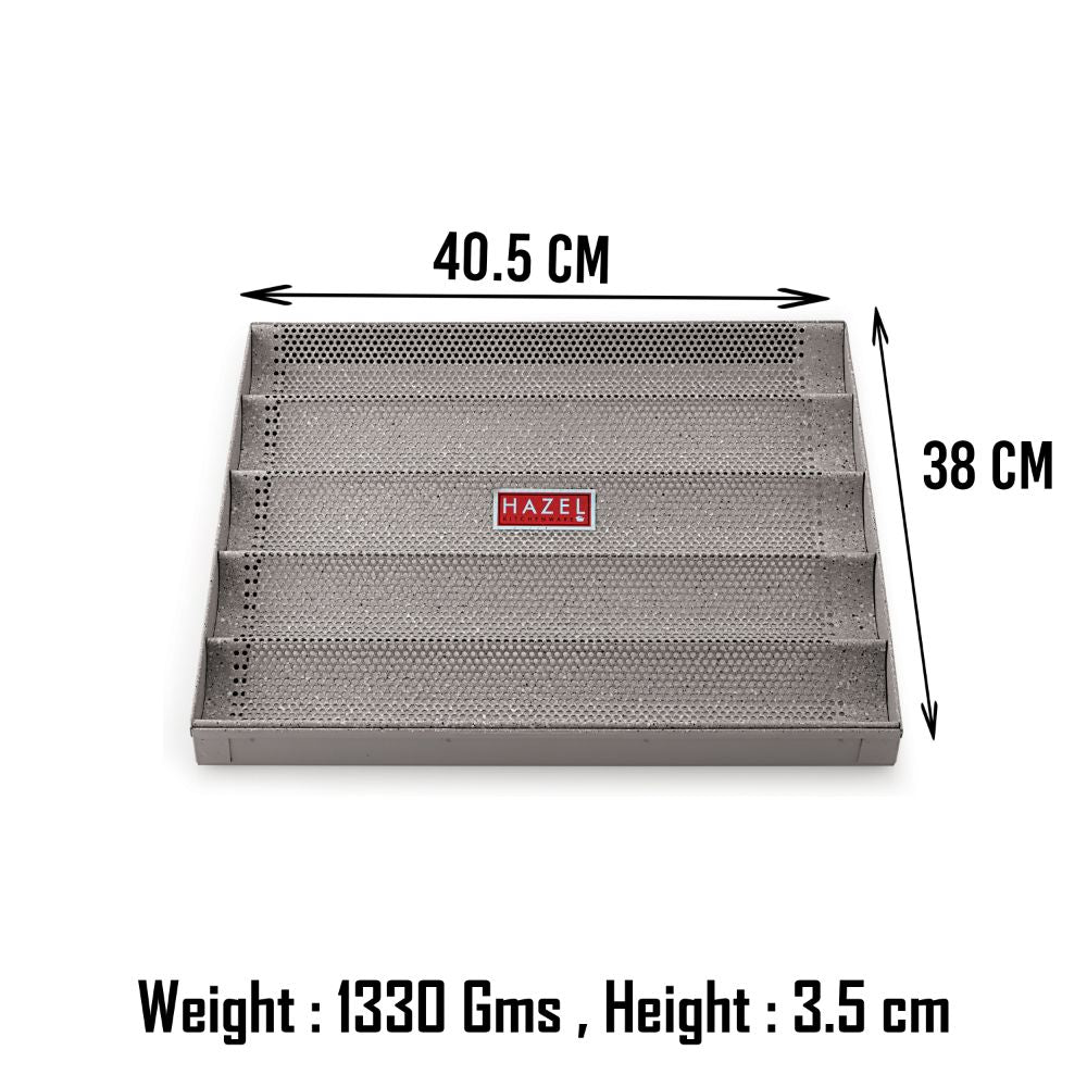 Perforated bread tray infographic showing ridged channels and raised side walls.