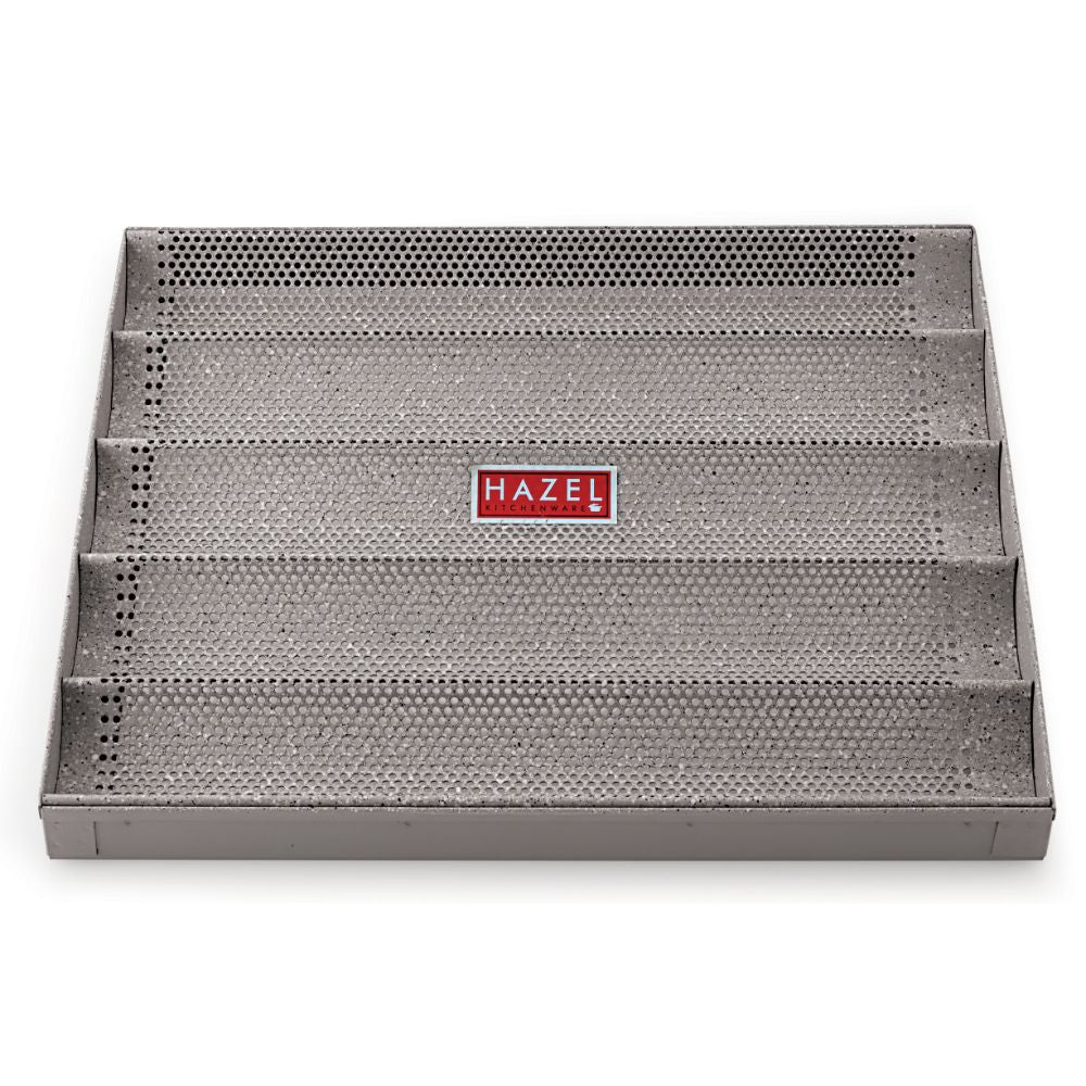 Grey perforated bread tray viewed from above.