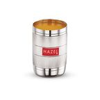 Steel glass filled with orange juice, front view on a plain white background.