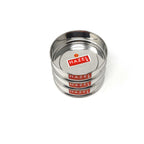 Three stacked empty stainless steel dabbas on a white background.
