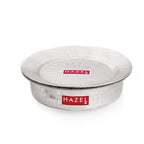 Empty hammered aluminium patila with its lid closed on top, shown on a plain white background.