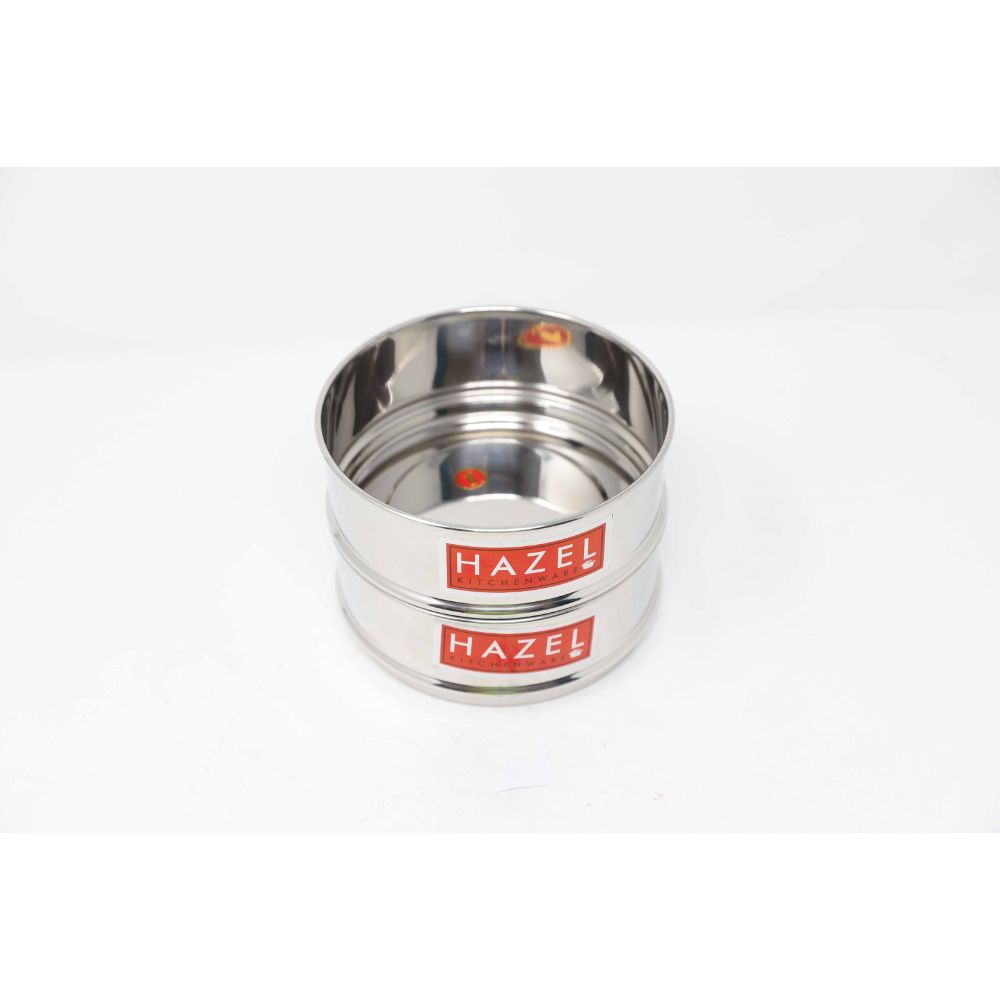 Two empty dabbas stacked, front view on a plain white background.