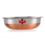 The tasla without its lid, shown from a front angle highlighting the copper bottom, on a white background.
