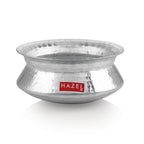 Hammered aluminium degri pot without its lid on a plain white background.