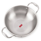Single triply steel kadhai with two side handles viewed from a raised angle on white.