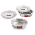 Three aluminium hammered patilas with lids in different sizes arranged together on a white background.