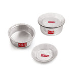 Two hammered aluminium patilas and a lid arranged together on a white background.