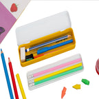 Open pencil box with pencils, an eraser and a pen inside, next to a separate slim pencil case with colored.