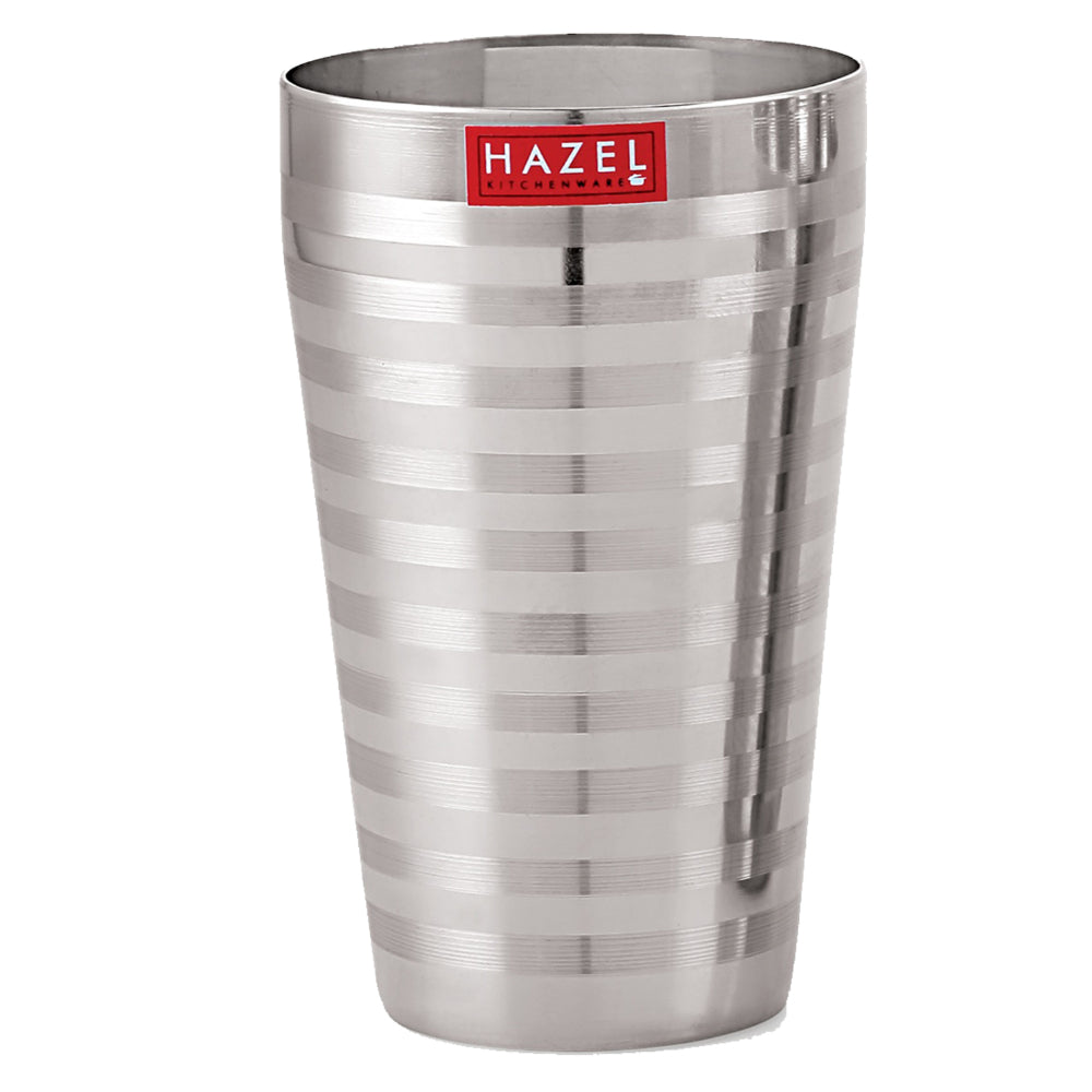 A single empty ribbed steel jumbo glass shown front-on on a white background.
