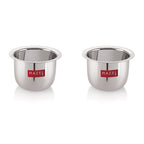 Two small stainless steel tea cups shown side by side on a white background.