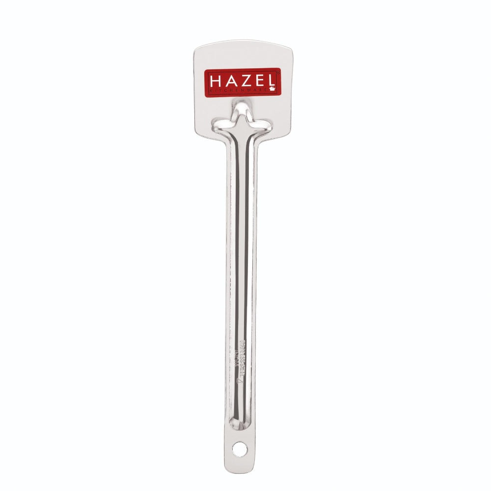 A single flat turner and tavetha utensil shown alone, upright, on a white background.