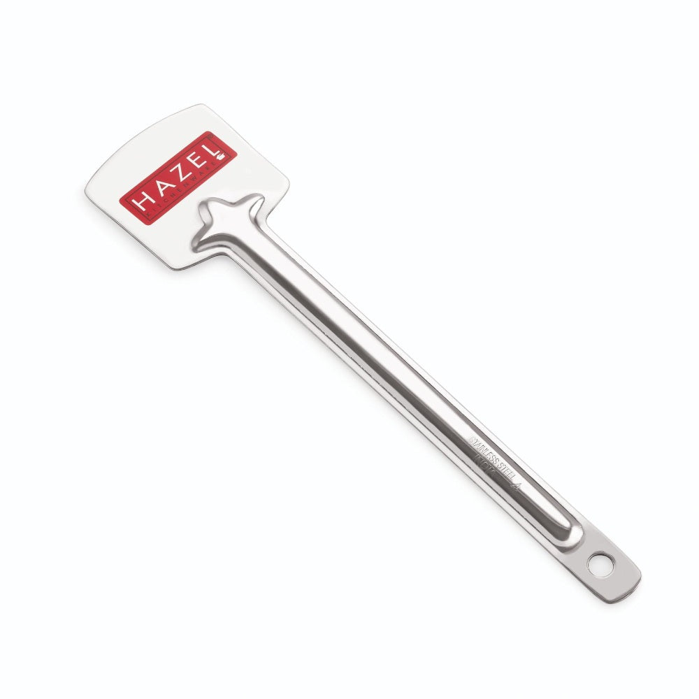 Stainless steel flat turner with a long handle and hanging hole, shown diagonally on white.