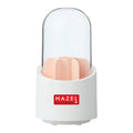 Clean studio shot of the white multipurpose organizer with a clear dome lid and pink internal dividers, HAZEL logo.
