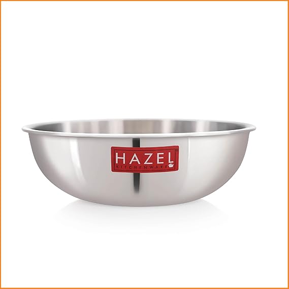 Stainless steel tasla viewed from the side showing its polished exterior and red HAZEL label on a plain white background.
