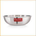 Stainless steel tasla viewed from the side showing its polished exterior and red HAZEL label on a plain white background.