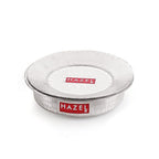 Single lidded hammered aluminium patila shown from the side on white.