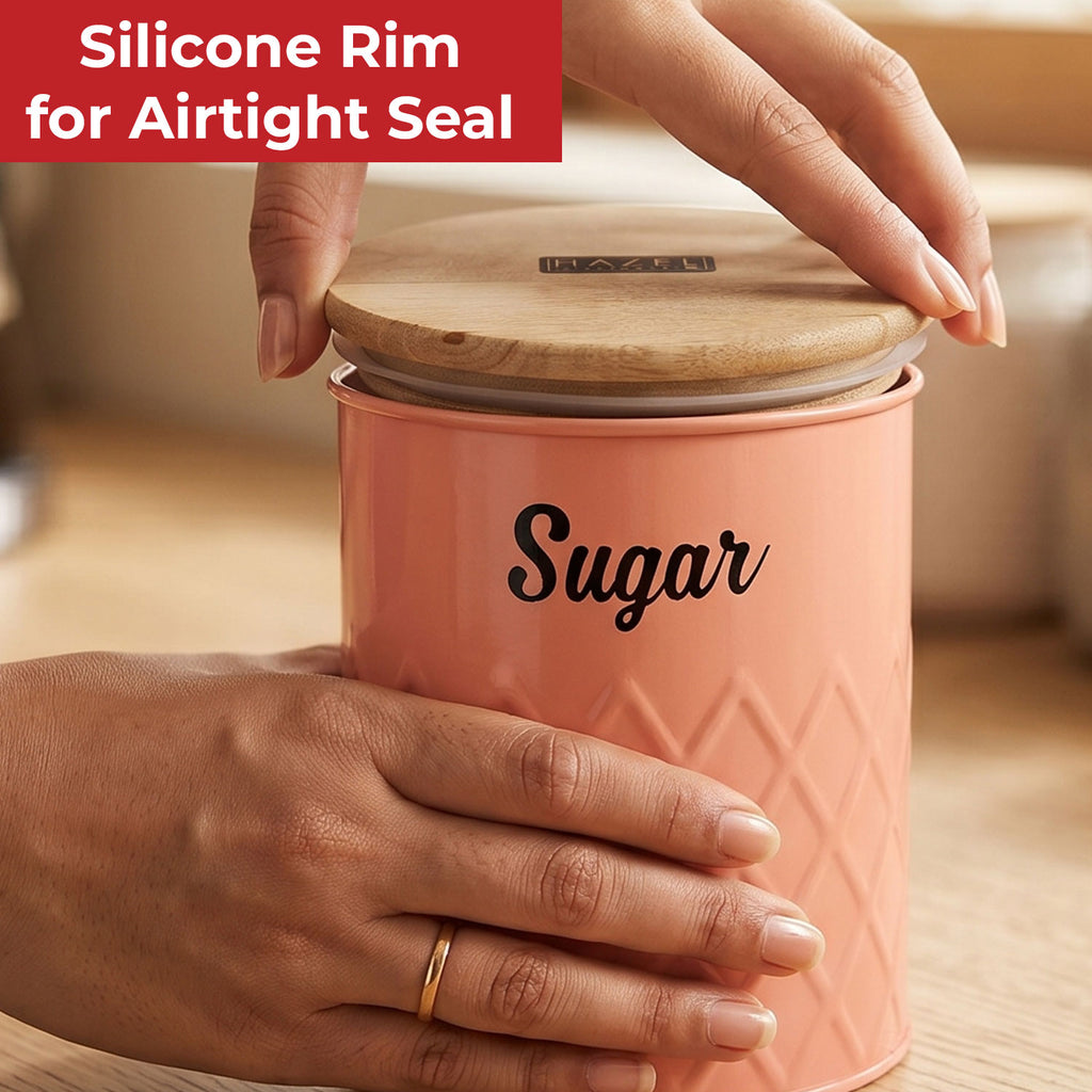 Infographic titled Silicone Rim Airtight Seal showing hands lifting the wooden lid off the pink Sugar canister.