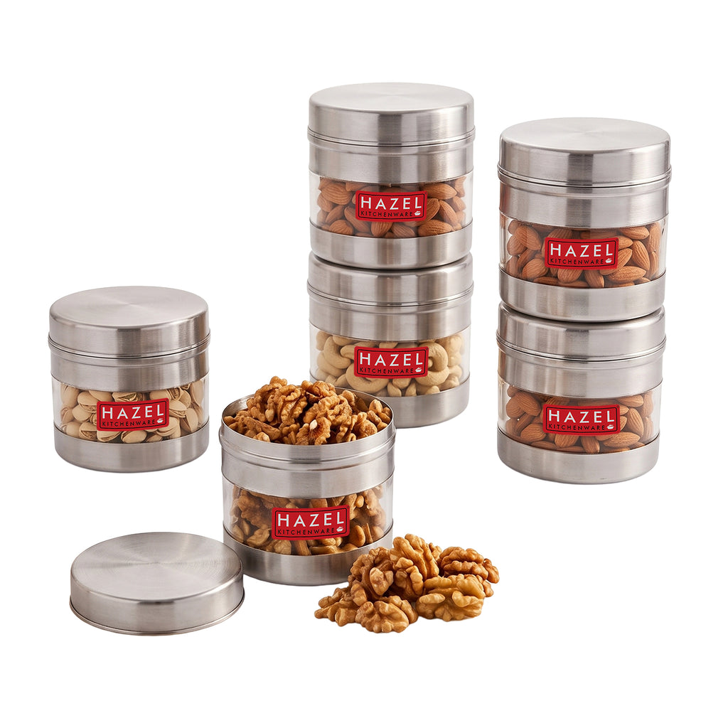 Stainless steel storage container with transparent section viewed from above.